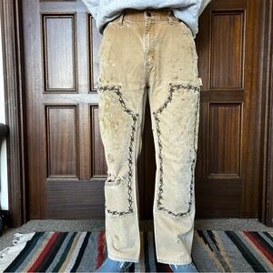 CARHARTT
Brown barbed wire carpenter workwear jeans